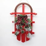 Red Wooden Christmas Sled Wall Decoration – Rustic Fir Wood Holiday Door & Wall Hanging - Main View