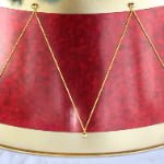 Red Metal Christmas Tree Collar with Gold Trim & Decorative Rope Design - Detail View
